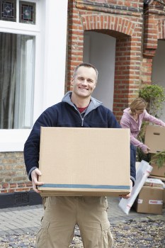 Mover loading furniture safely into a van