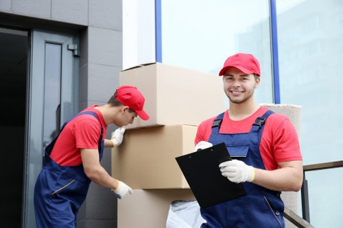 Careful furniture handling by house removalists during an Ilford move
