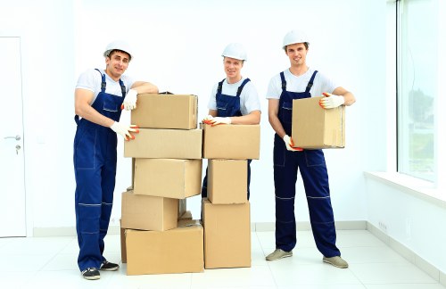 Office removals in Ilford with packed desks and moving equipment