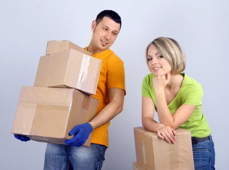 Professional man and van helping with furniture delivery in Ilford
