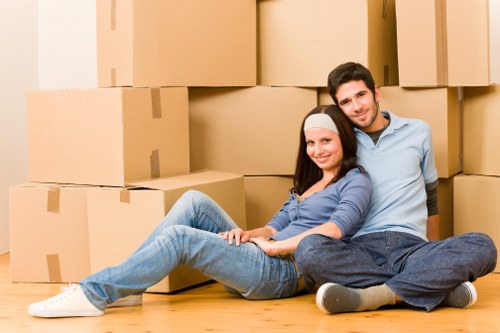 Loading household items from an Ilford property for transport