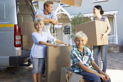 Furniture loading into a moving van for an Ilford home move