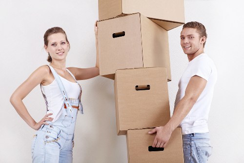 Team loading furniture into a moving truck in East London