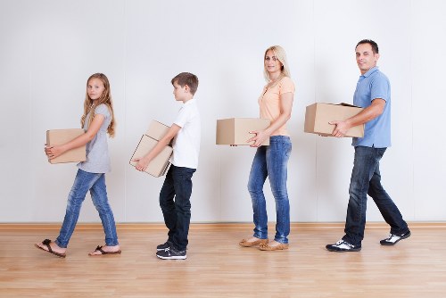 Furniture being moved from an Ilford flat