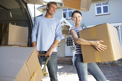 Moving van loading household items for transport